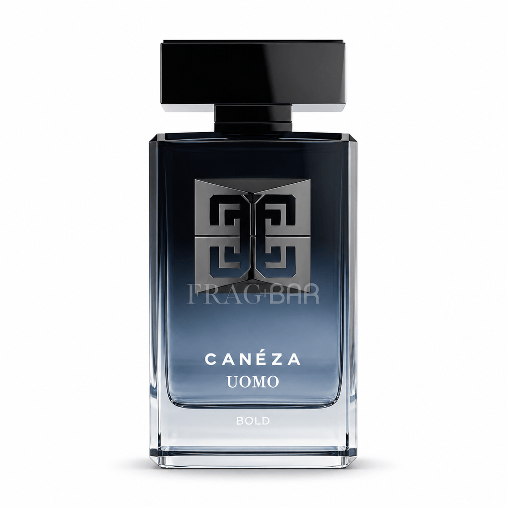 A bottle of Frag Bar Canéza Uomo Bold cologne, featuring a dark blue gradient glass bottle with a black cap and silver logo details, set against a plain white background.